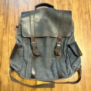 Leather Straps and Gray Backpack